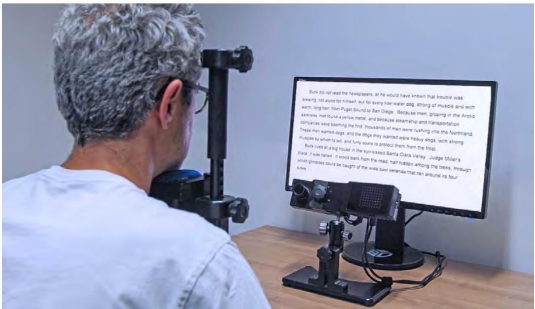 Figure 1: Example of arrangement of equipment, participant and computer monitor for eye-tracking data collection